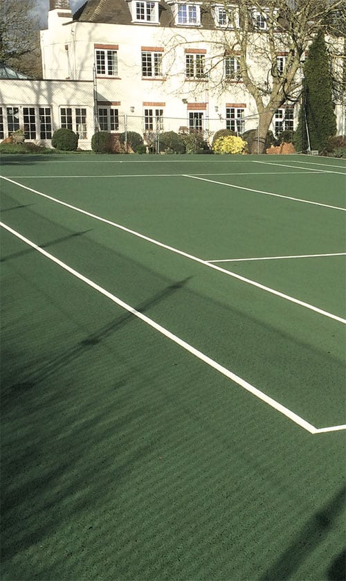A tennis court carpet cleaned by EnTC