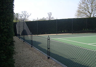 En Tout Cas's obelisk tennis court fence suports