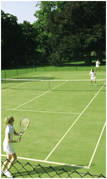 Mixed doubles on an En Tout Cas tennis court
